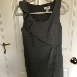 Gray sleeveless work dress.